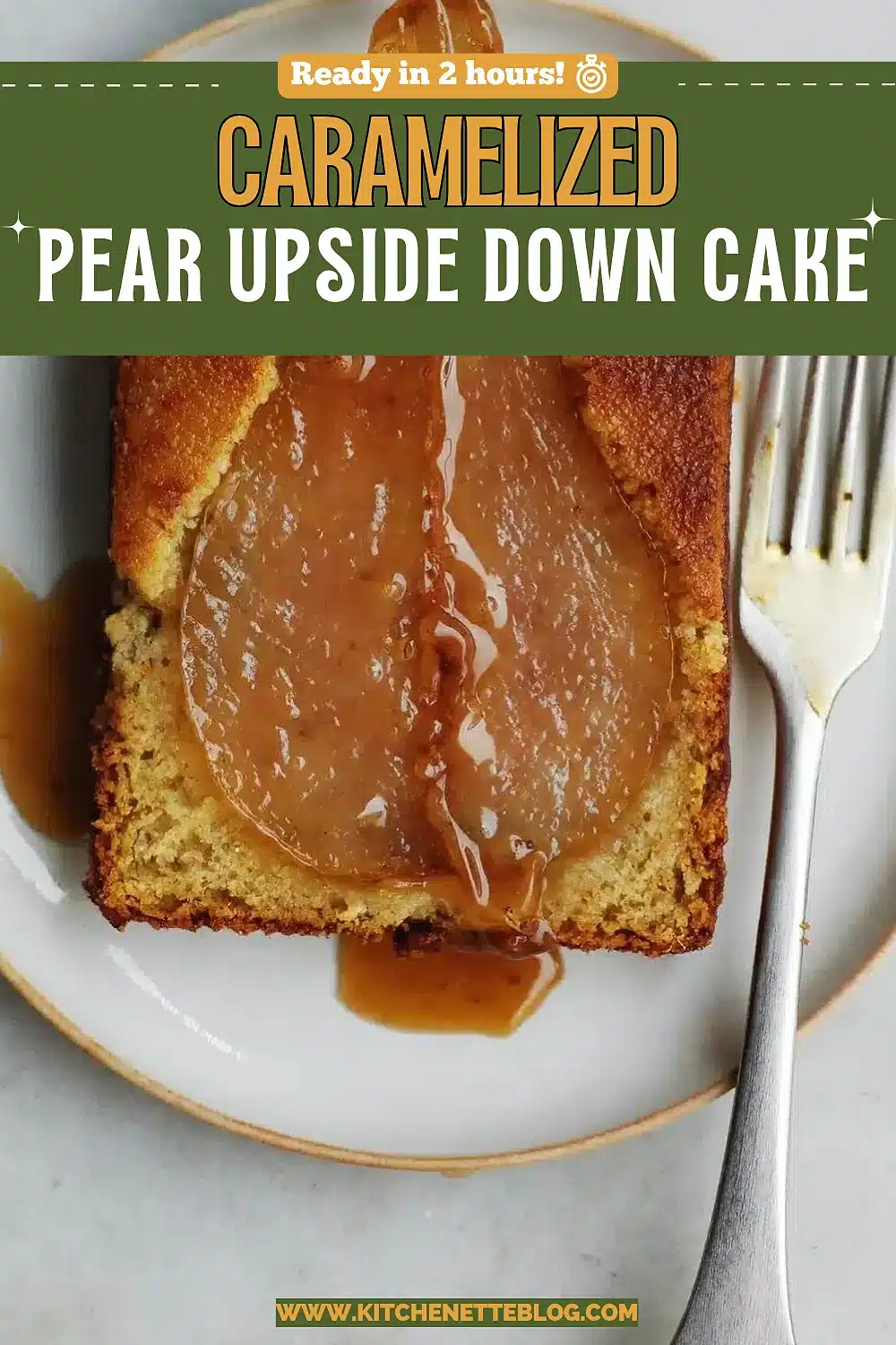 Caramelized fruit fanned over a golden sponge on a white stand