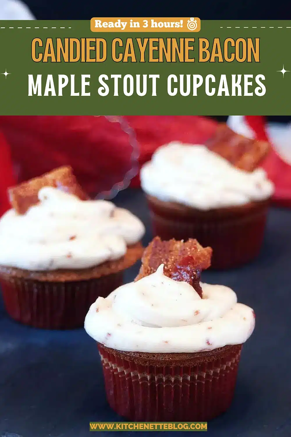 Three frosted cakes on a slate board, each with a strip of crisped pork on top
