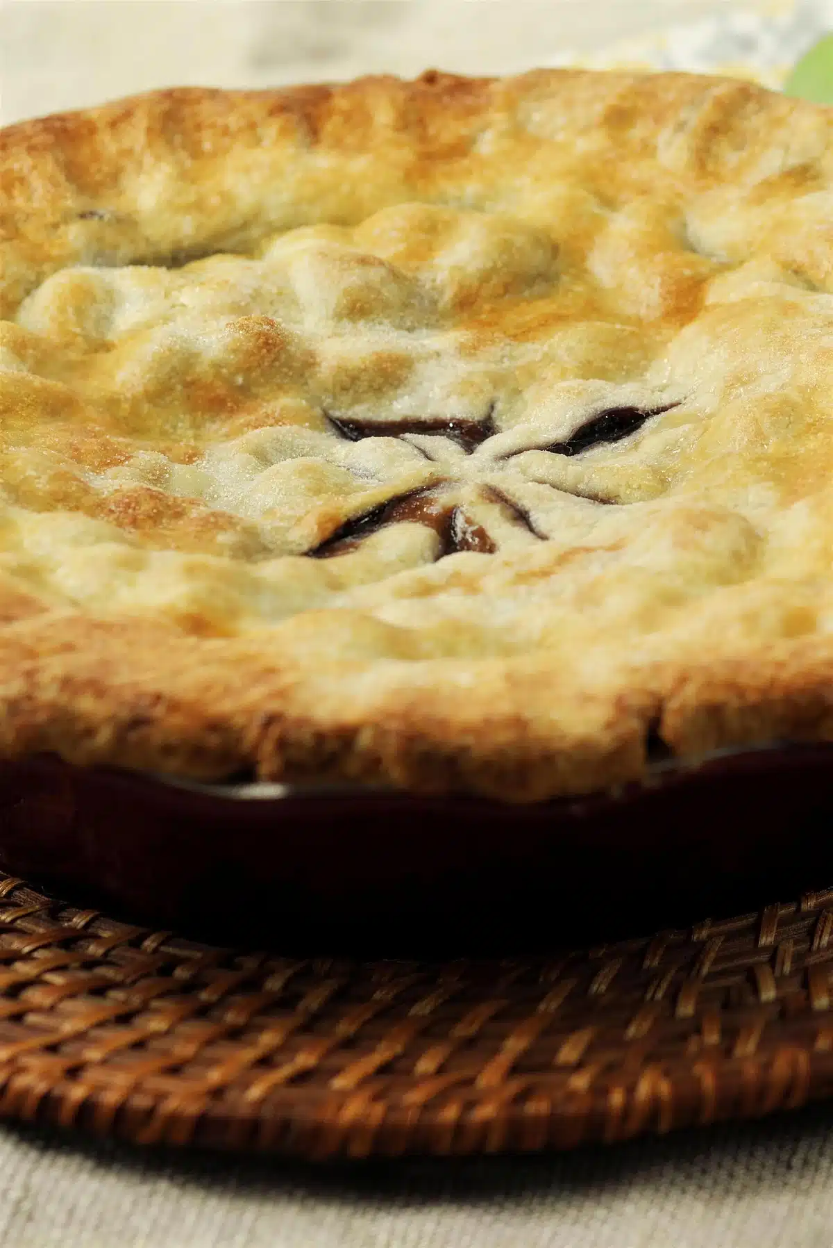 Blueberry rhubarb pie with steam vents cut into the top crust