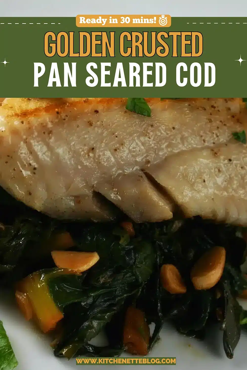 White fish fillet on wilted greens with sliced garlic