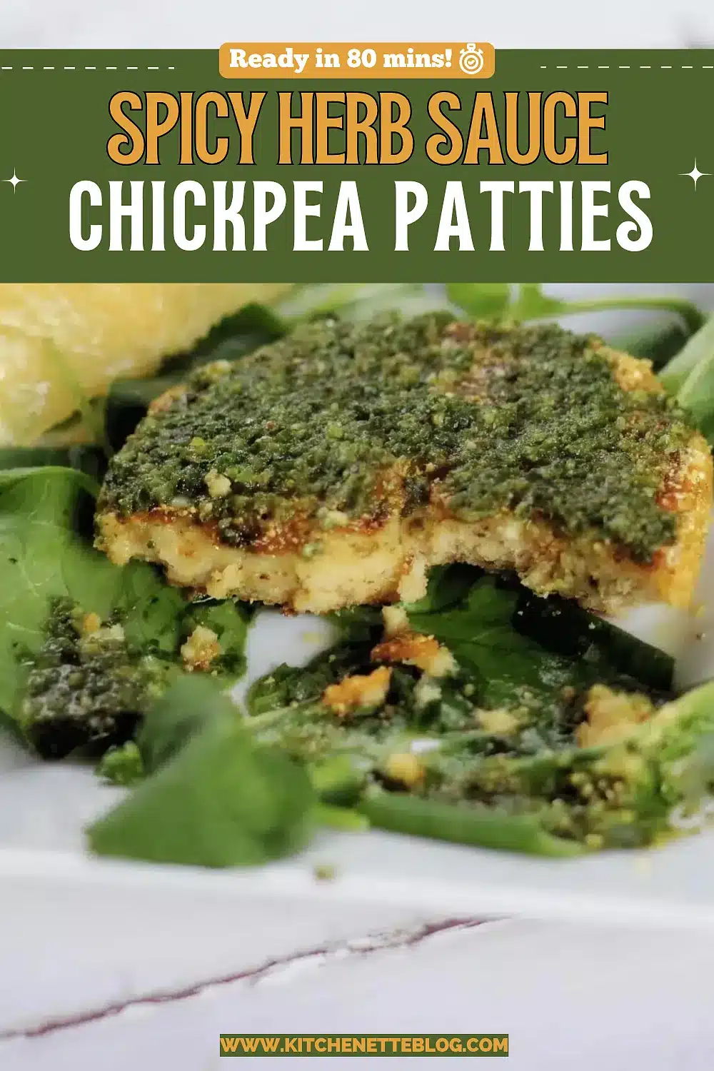 Golden pan-fried round split open on greens with bright green herb sauce and a lemon wedge