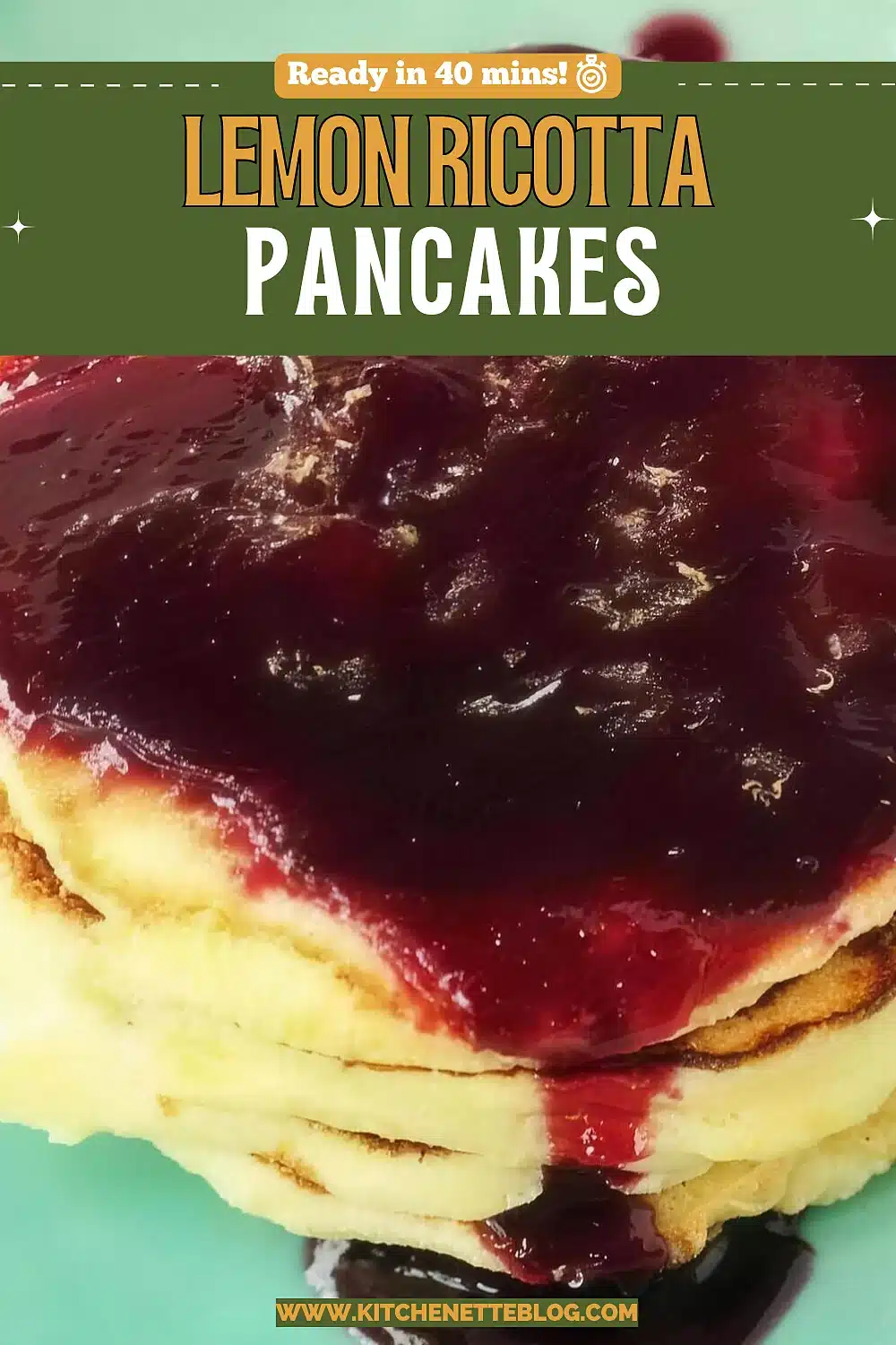 A tall stack of pale golden pancakes on a mint green plate, drenched in a glossy dark blueberry syrup running down the sides