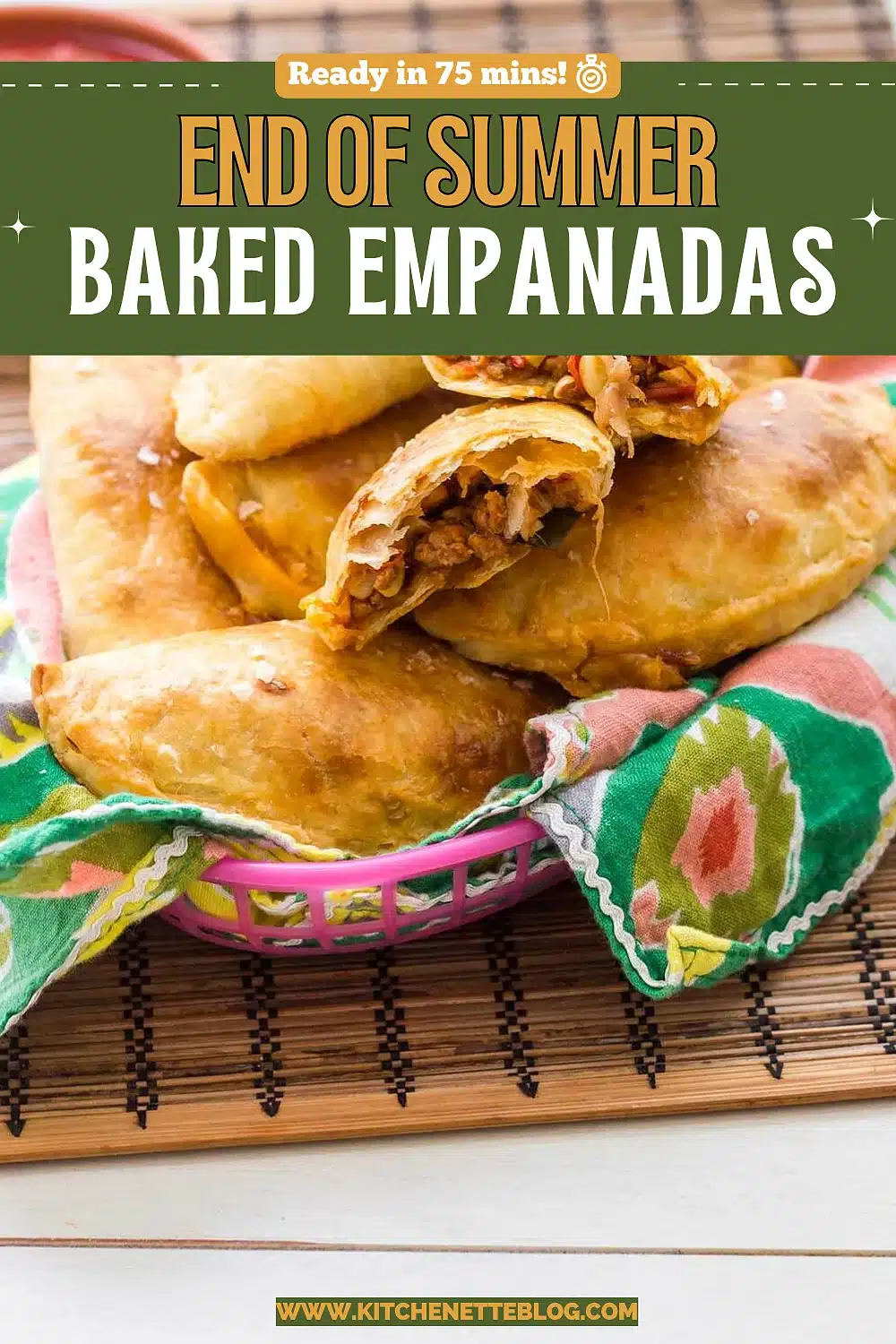 Golden pastry half moons piled in a bright basket beside a bowl of salsa