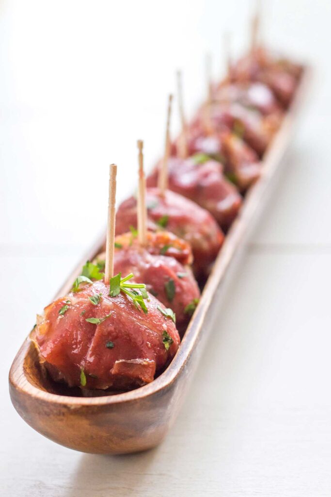 Stuffed Prosciutto Meatballs with Cranberry Glaze