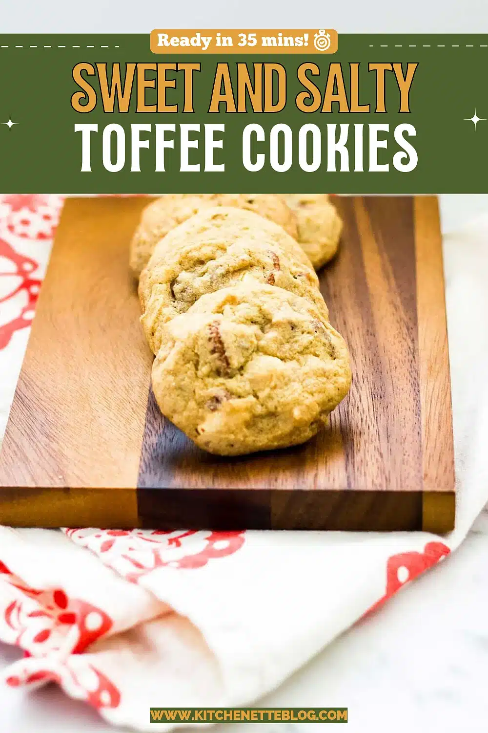 Fresh from the oven and cooling on a wooden board beside a red print napkin