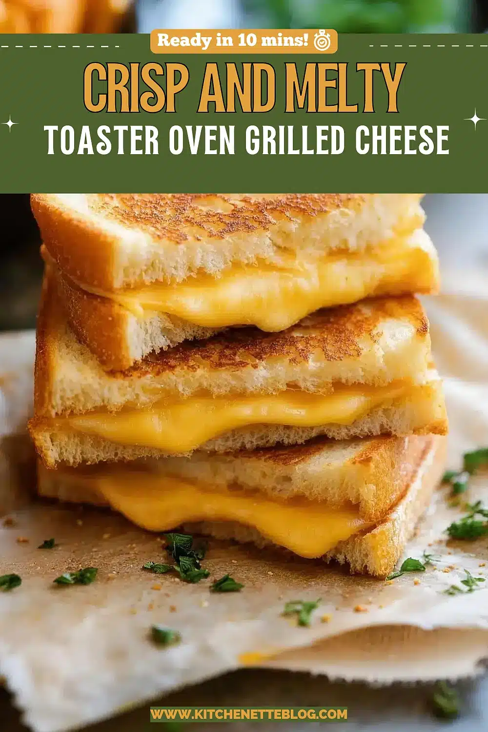 Stack of golden sandwiches with melted cheddar pulling between the slices