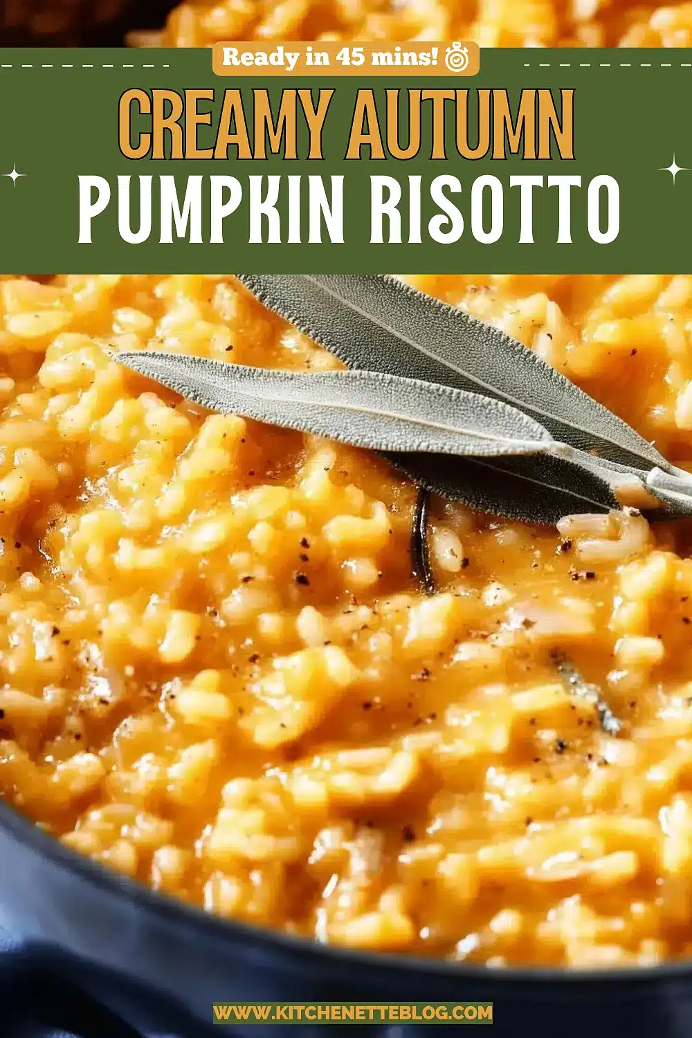 Creamy orange rice dish finished with sage in a wide pan