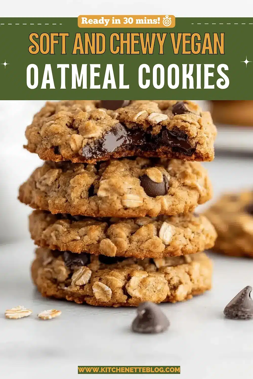 Stack of chewy oat rounds with melted dark pieces showing at the edges