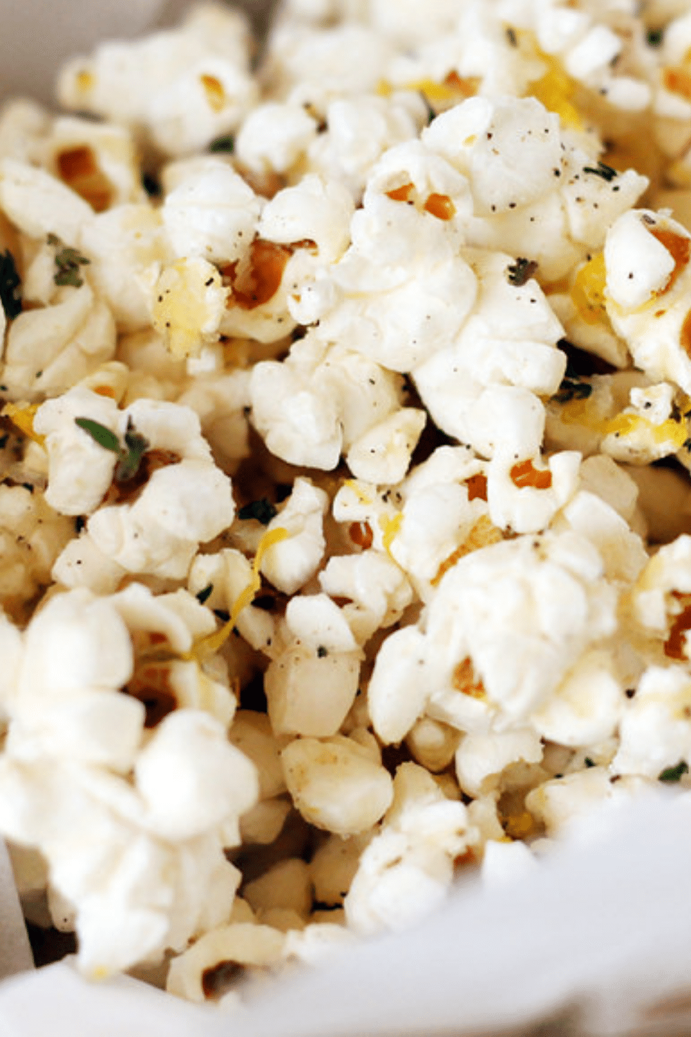 Close-up Cheesy Lemon Thyme Popcorn ready for a netflix break