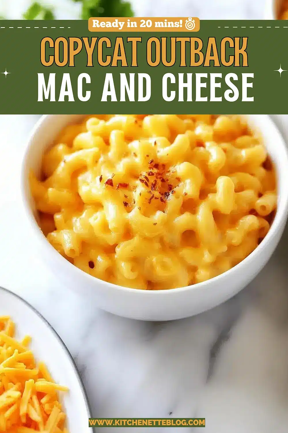 Bowl of creamy elbow pasta in a thick orange sauce