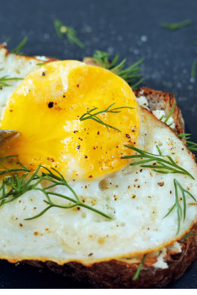 Open-Faced Egg & Goat Cheese Sandwich close up shot