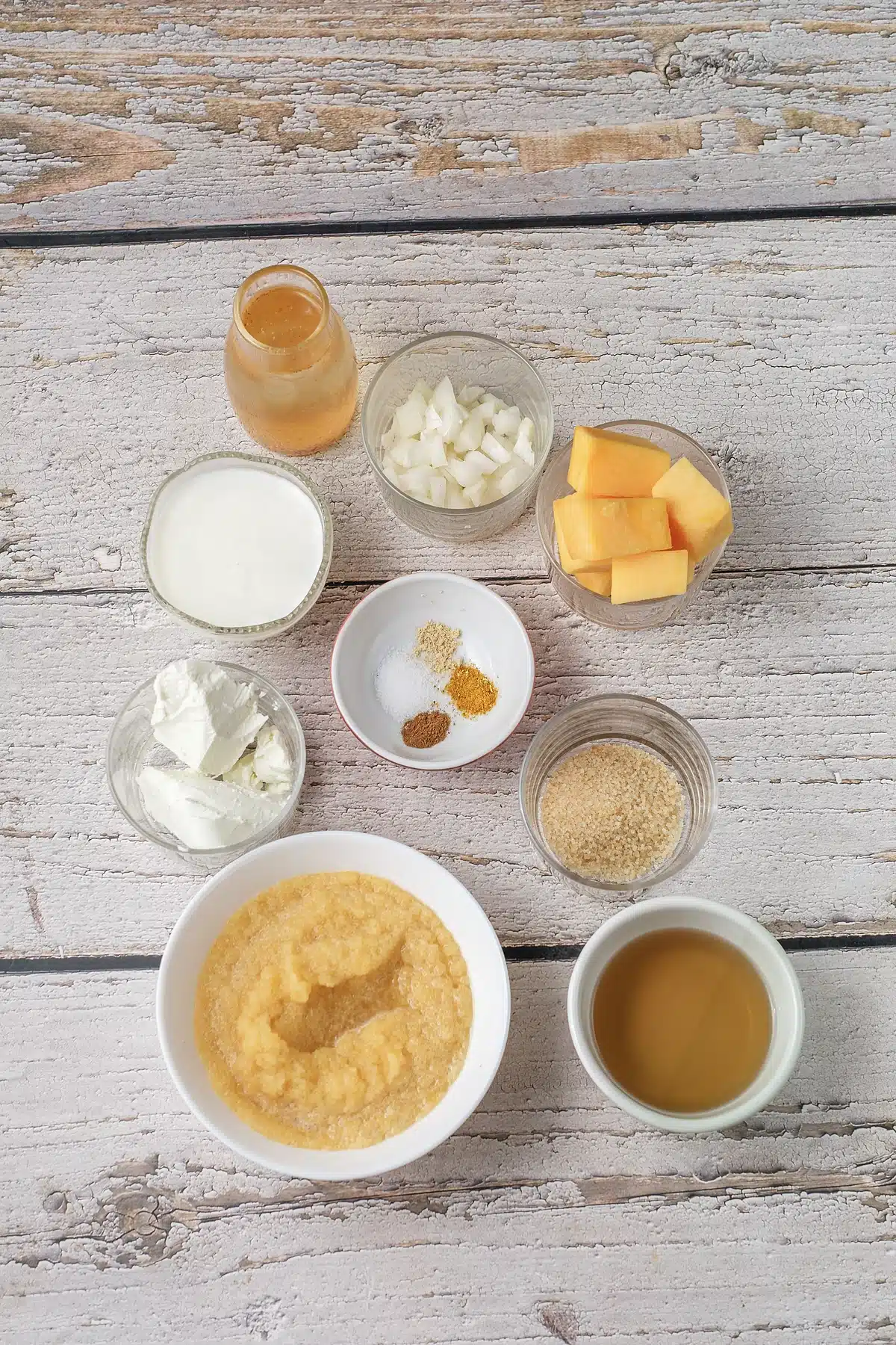 Cubed butternut squash, squash puree, cream cheese, spices, brown sugar and cider in glass bowls