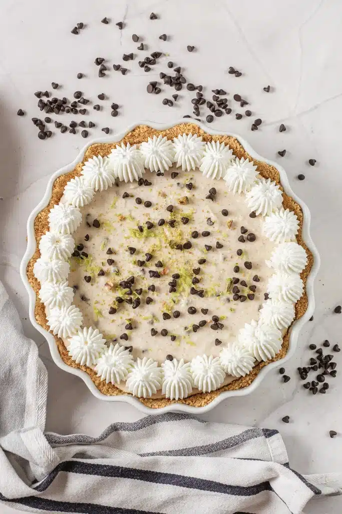 Cannoli pie seen from directly above in a fluted white dish