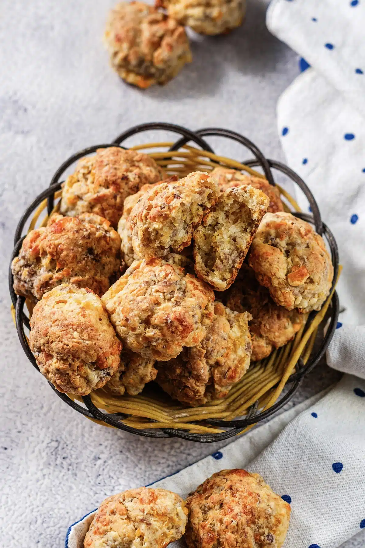 A basket of golden brown bites seen from above on a gray counter