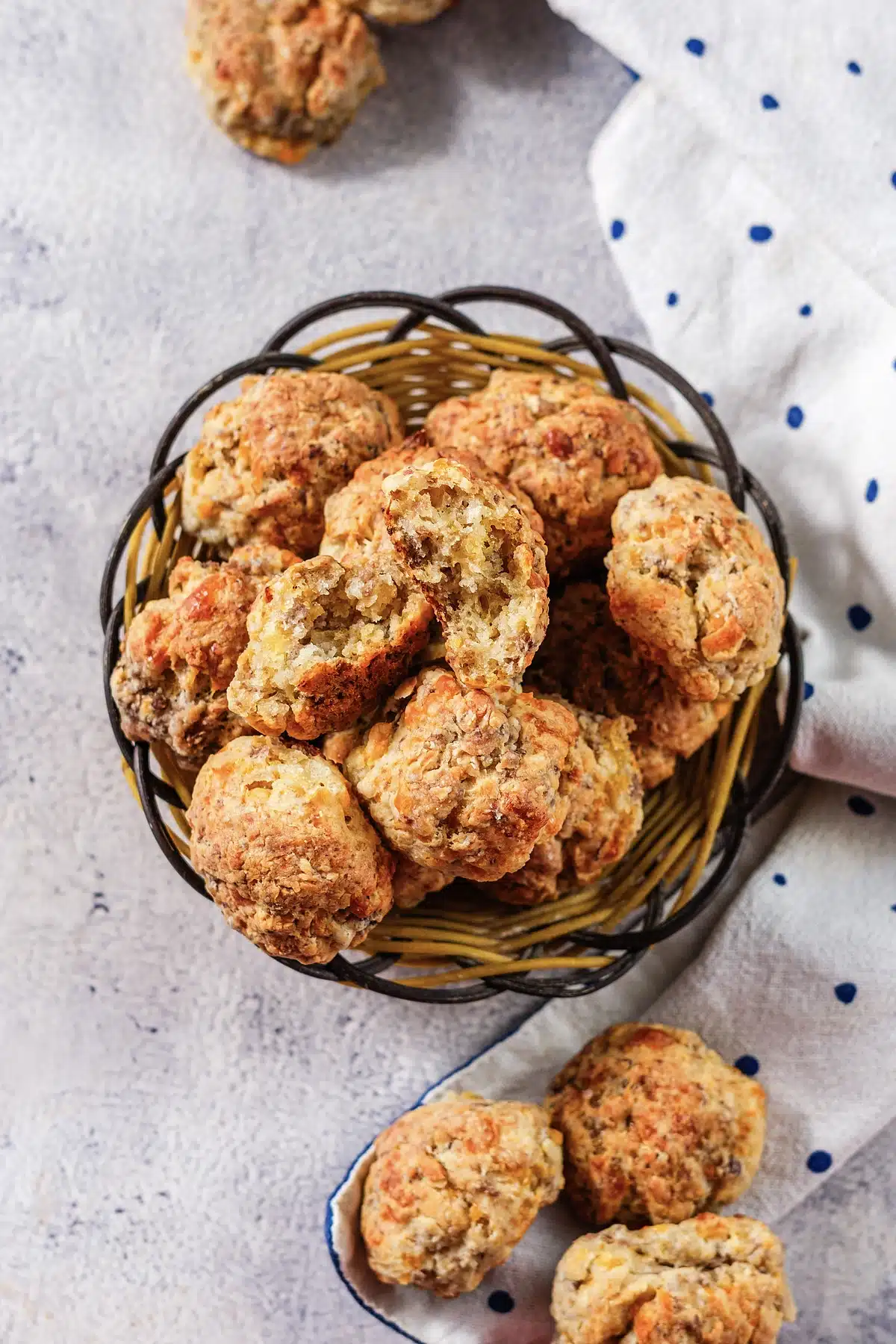 Red Lobster sausage balls piled in a basket with a blue-dotted cloth