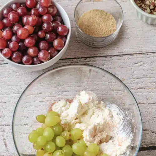 Pale green fruit tipped into the whipped cheese base