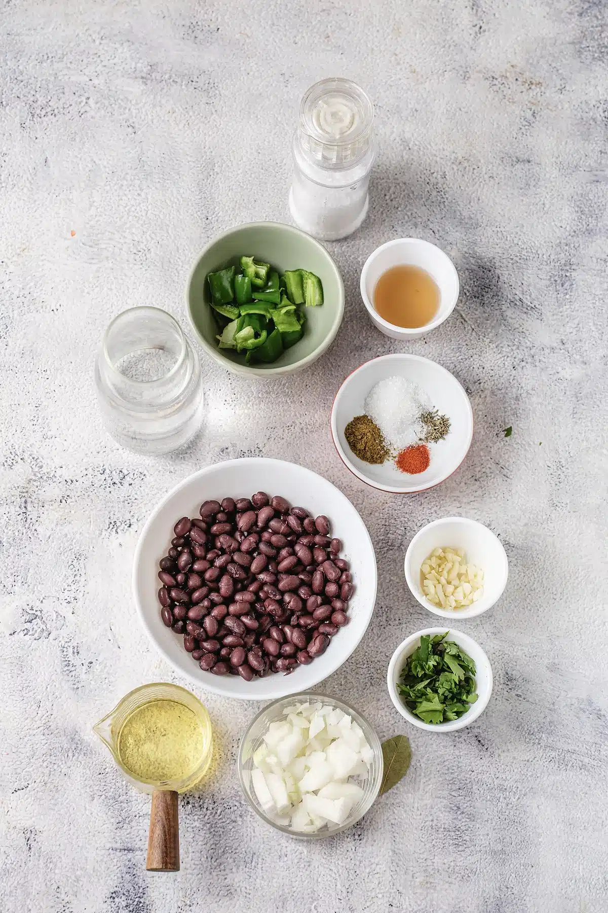 Canned black beans, green pepper, onion, garlic and spices for cuban black beans