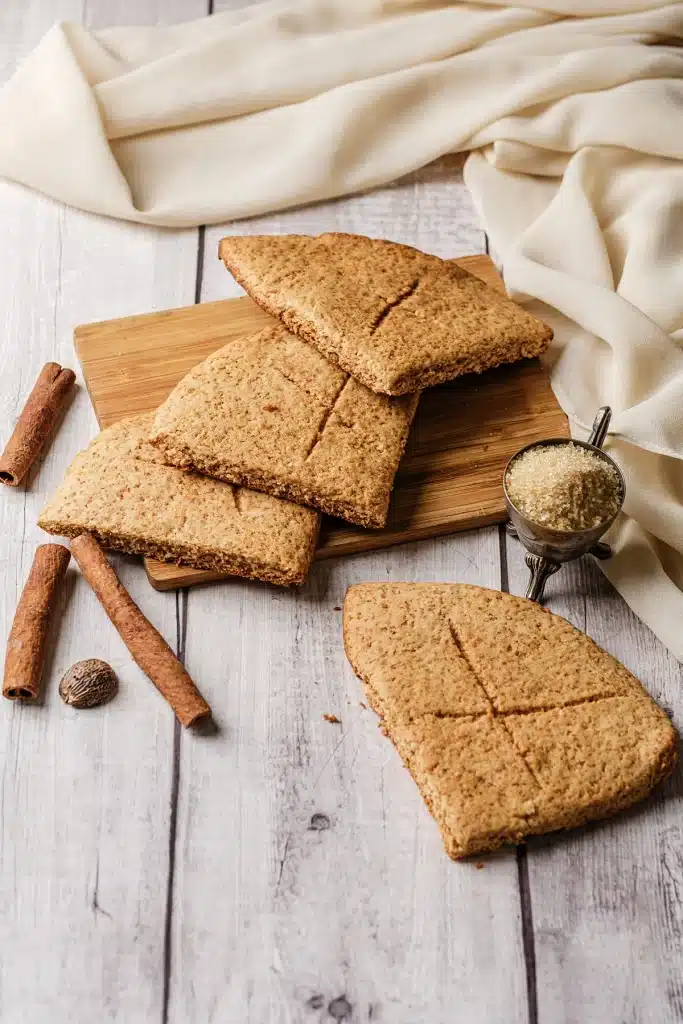 Lembas bread seen from above on a bamboo board with a cream cloth behind