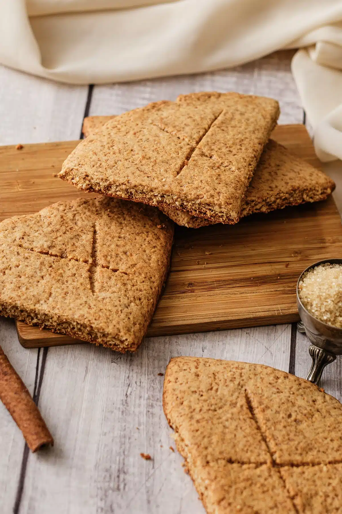 Lembas bread stacked on a board with a leaf shaped piece alongside