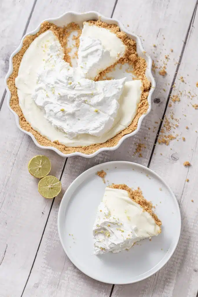 Lemon icebox pie in a fluted dish seen from directly above