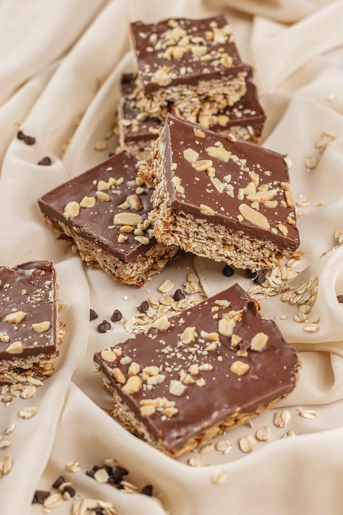 Oh Henry bars stacked so the oat base and chocolate layer both show