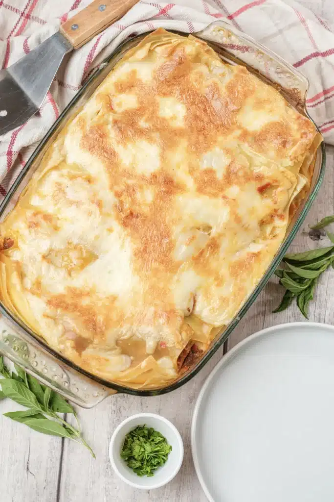 Olive Garden lasagna classico baked golden in a glass dish, seen from directly above