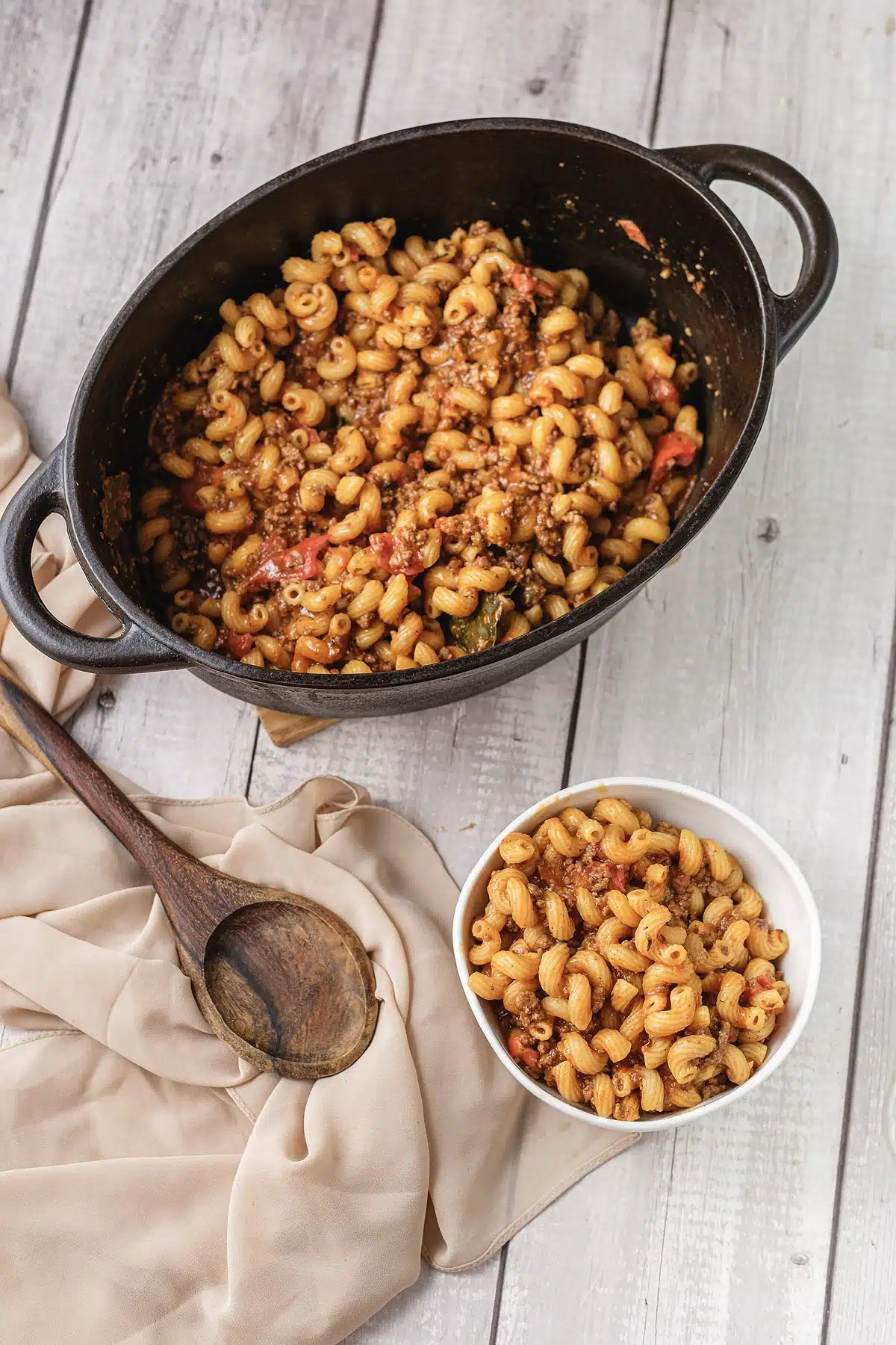 A pot of Paula Deen's version with a wooden spoon and a small serving bowl