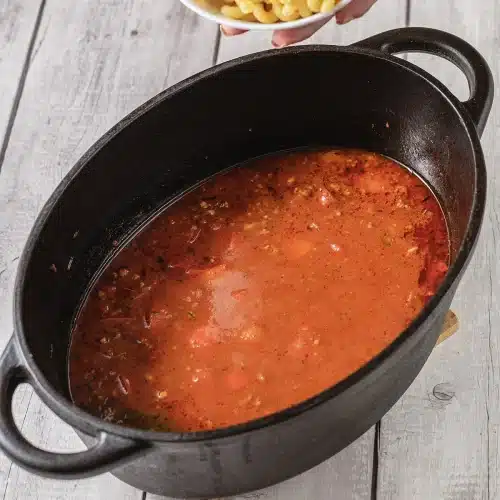 The tomato base simmering in the pot before the pasta goes in