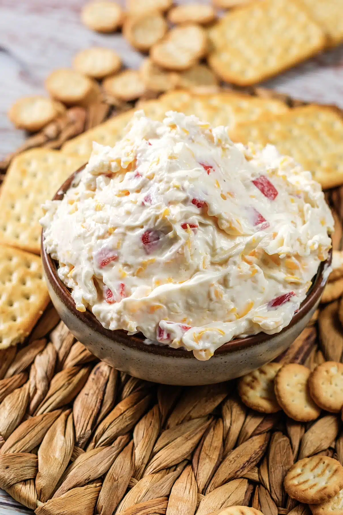 A close bowl of the spread piled high on a woven charger
