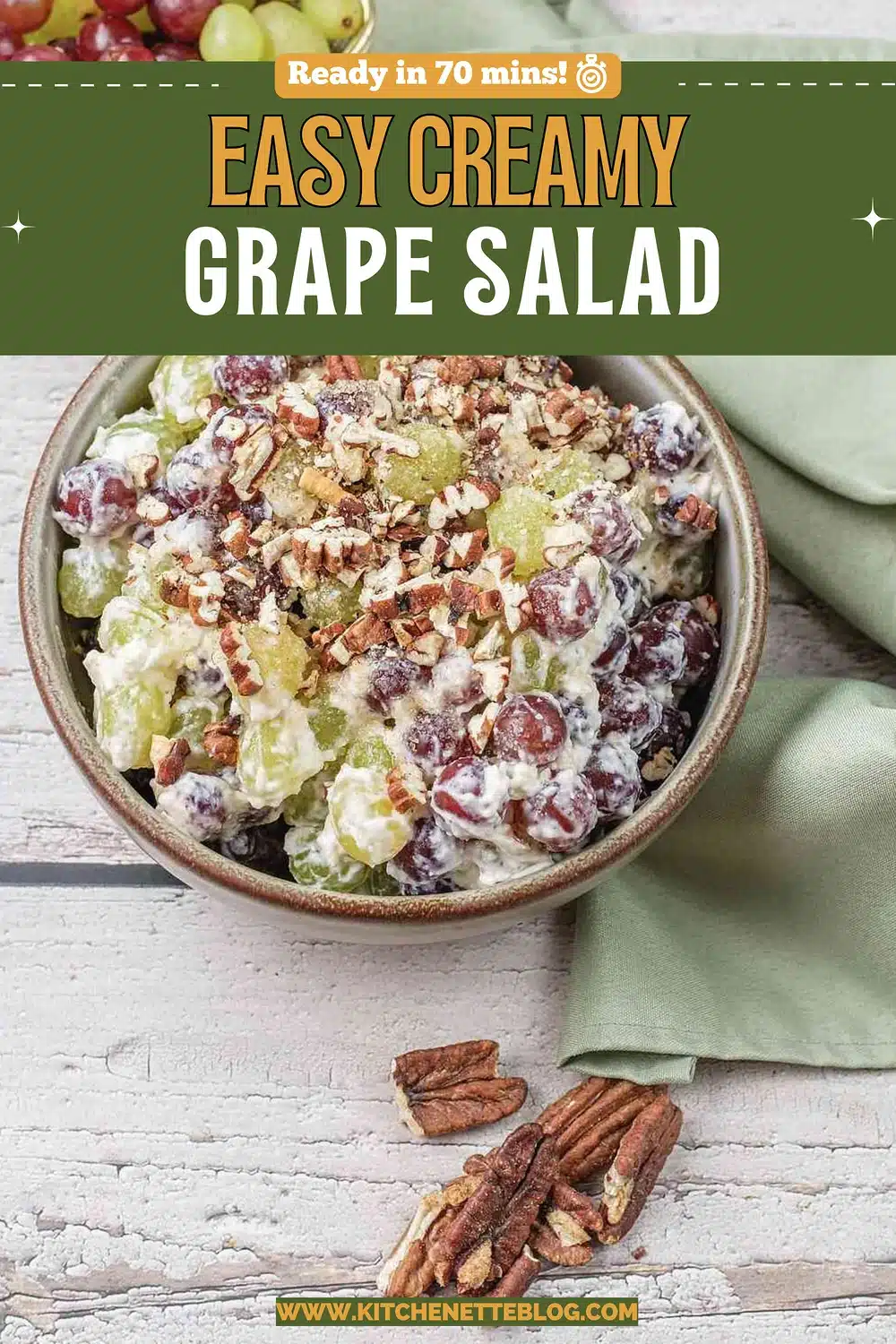 Chopped pecans scattered over a pale fruit mixture in a stoneware bowl