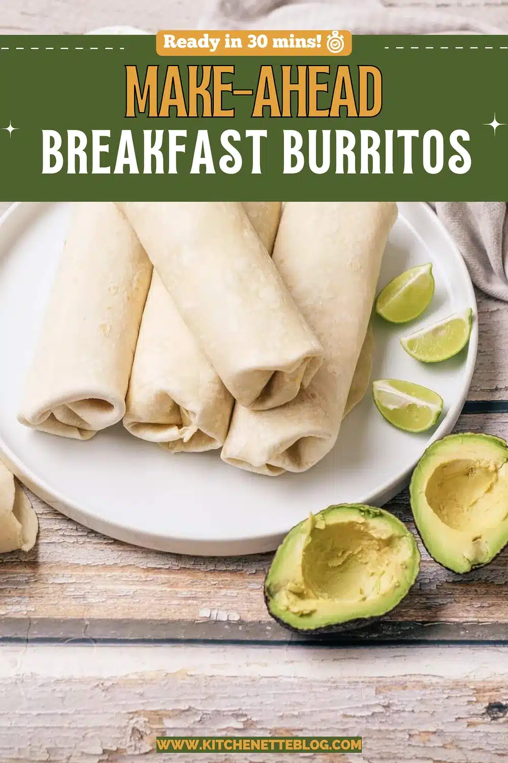 Rolled flour tortilla wraps stacked on a white plate with lime wedges and avocado halves