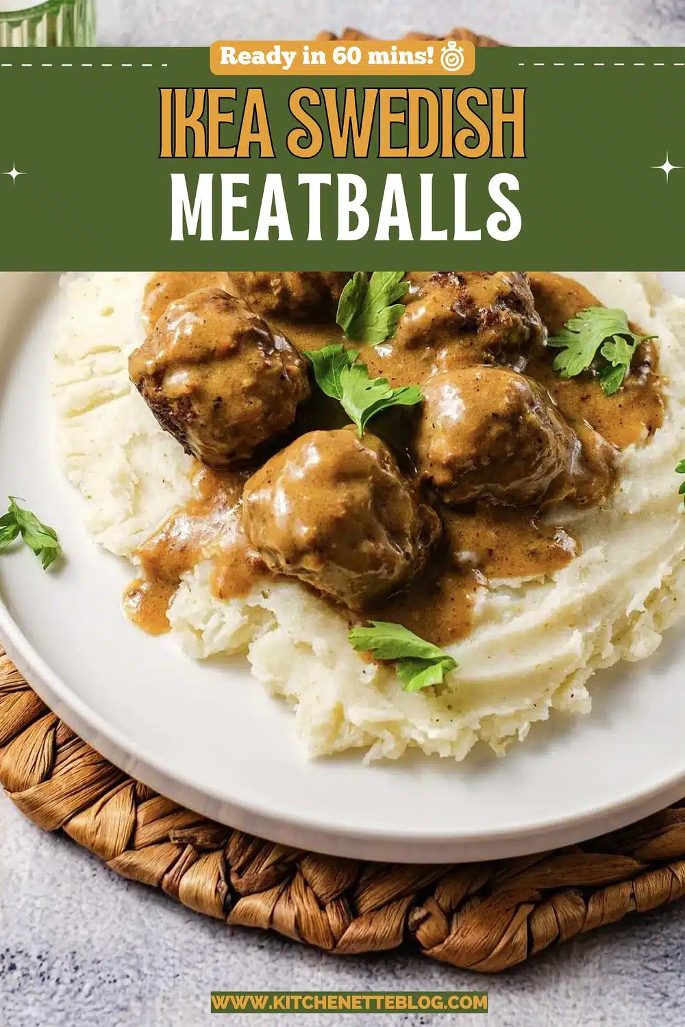 A plate of meatballs in brown gravy over mashed potato on a woven mat