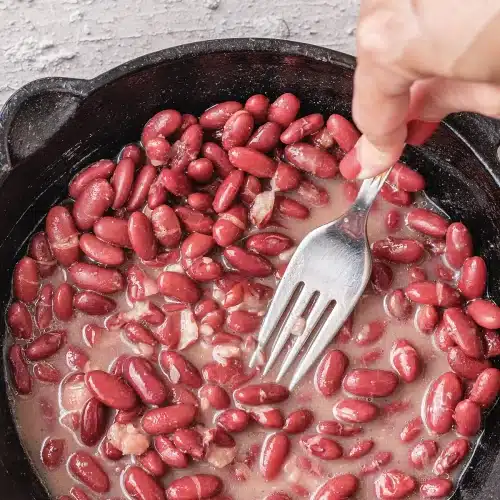 A close view of the thickened pot part way through the simmer