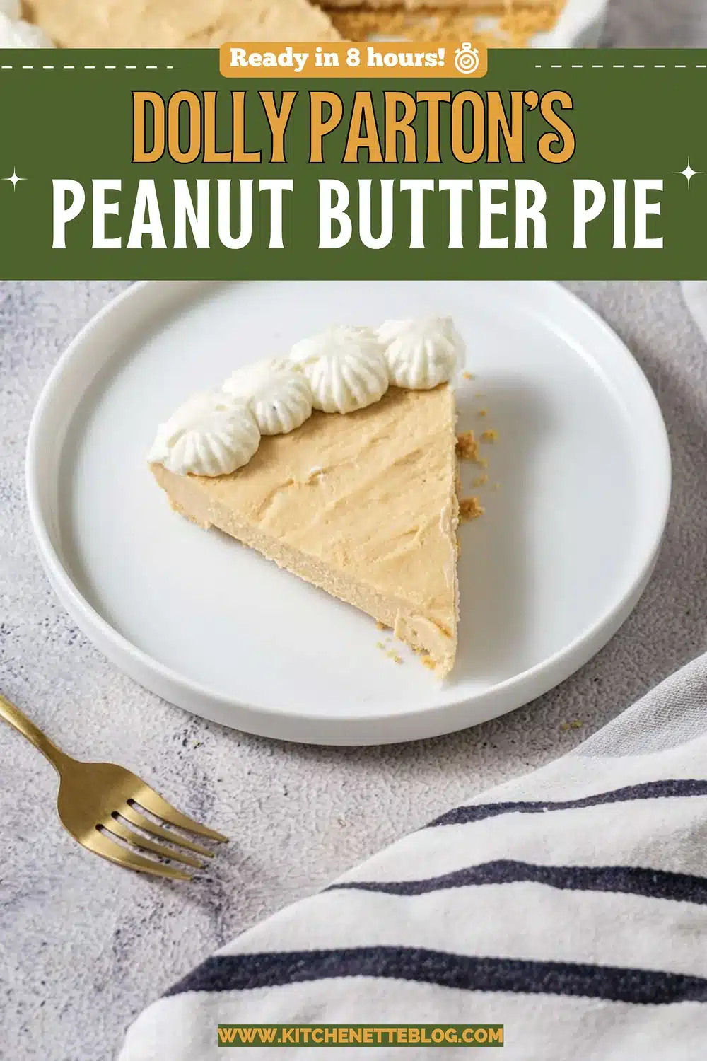 A slice of pale cream pie with a piped whipped cream border on a white plate beside a gold fork