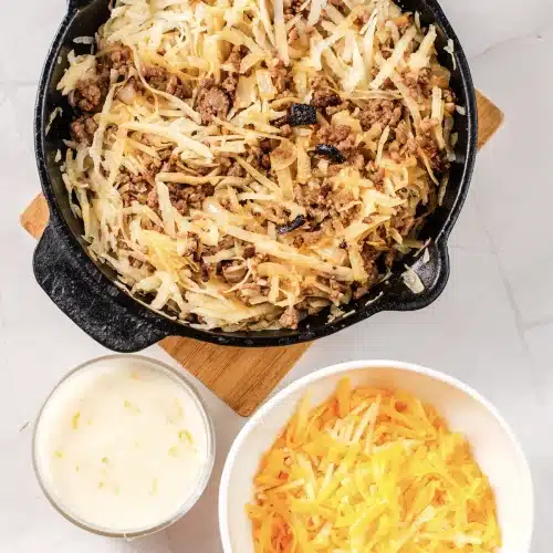The hash browns turned through the beef until evenly mixed